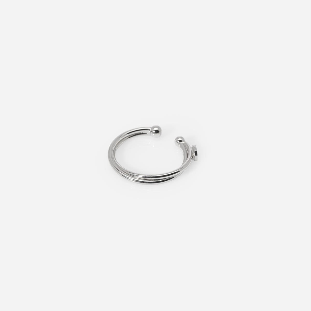 Bague d’oreille Aurore, ear cuff fin et léger en métal argenté, pour oreilles non percées, à la forme arrondie ouverte.