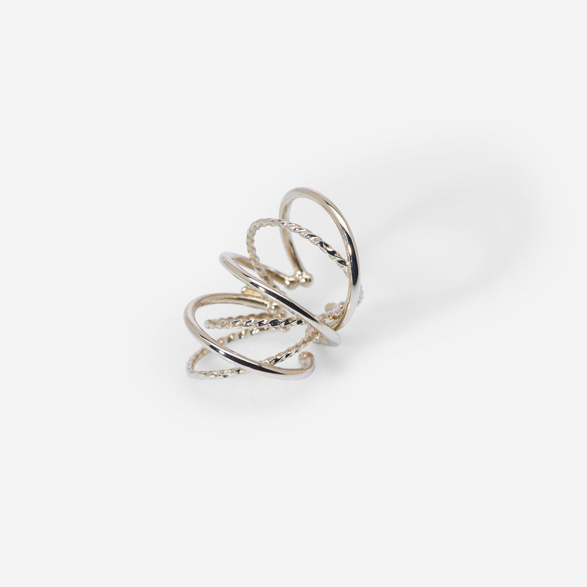 Bijou d’oreille unisexe Saturne en métal doré, pour oreille non percée, à la structure multi-anneaux.
